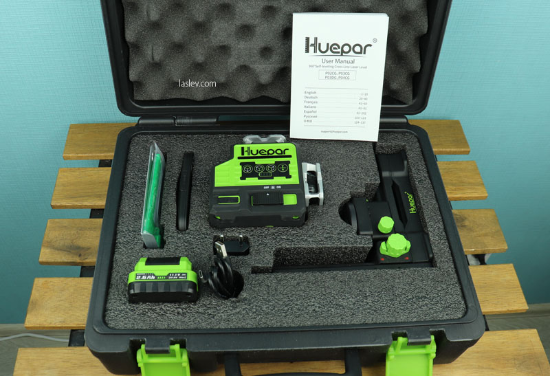 Complete Huepar P03CG laser level in large plastic case.