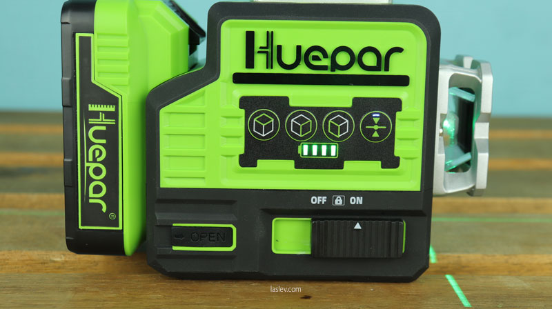 Buttons and toggle switch for operating the Huepar P03CG laser level.